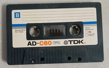 Evan Johns & The H Bombs music sampler cassette